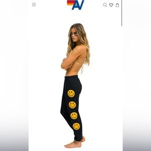 Womens Aviator Nation Smiley sweatpants in charcoal